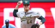 Cubs sign former A's reliever